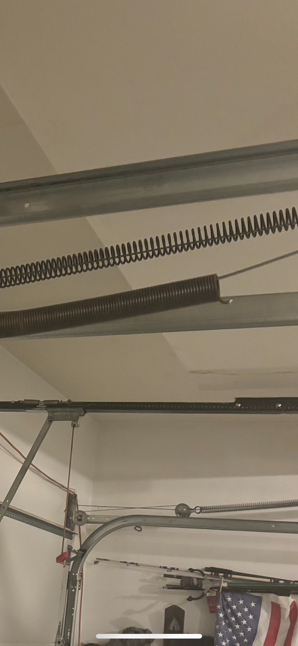 Garage door spring mechanism