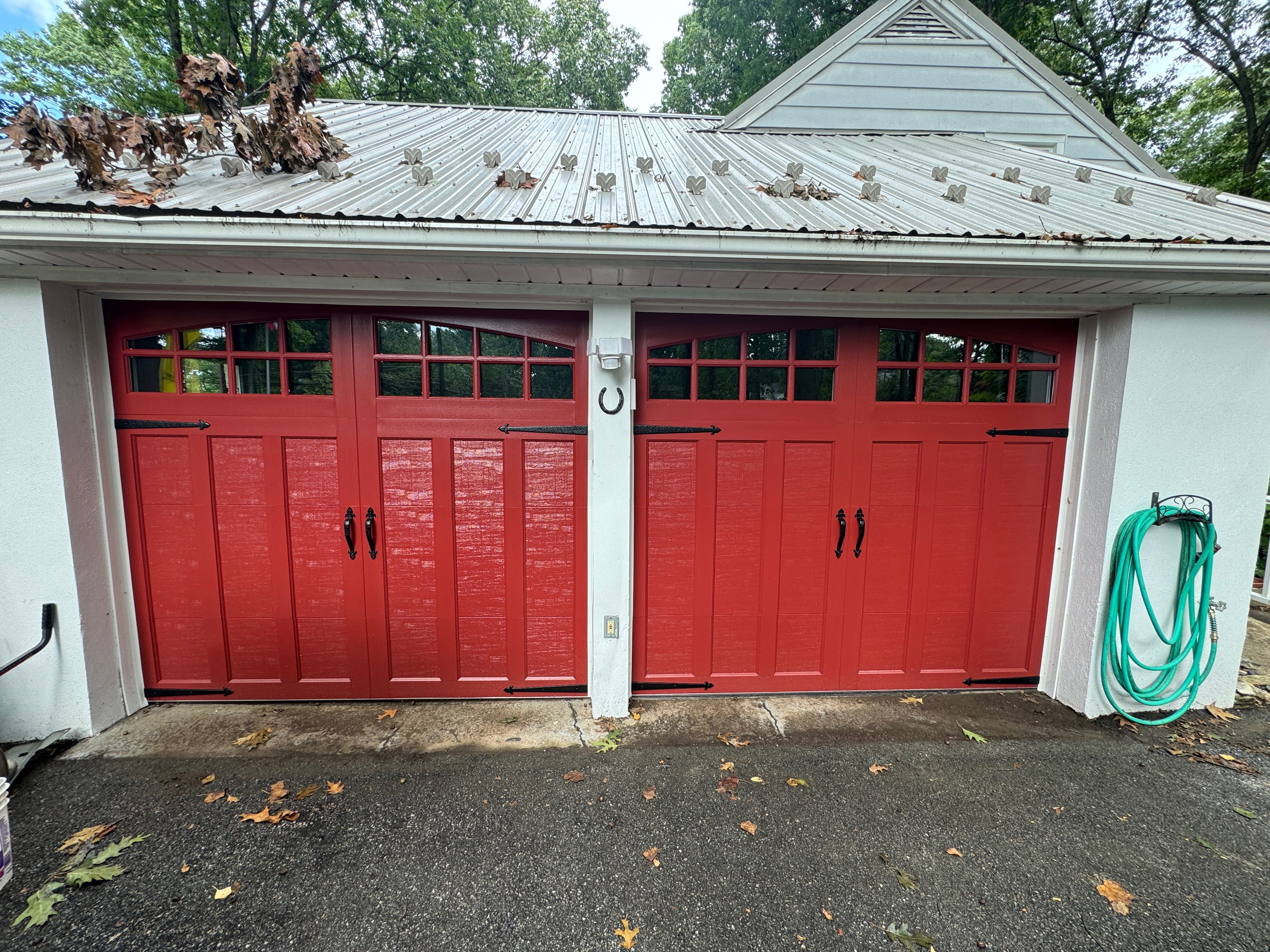 Beautiful red carriage style garage doors